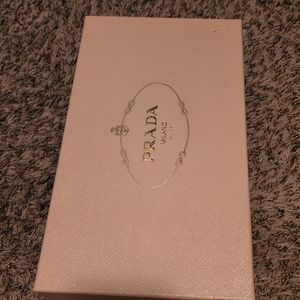 Prada nude d'orsay pumps.